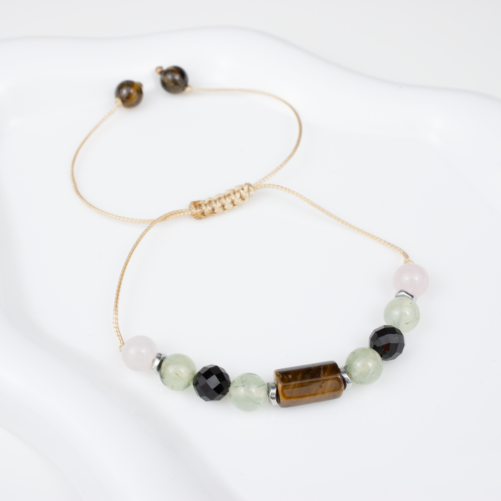 For twos (2, 11, 20, 29): Tourmaline, Rose Quartz, Tiger’s Eye, Prehnite bracelet on a cord