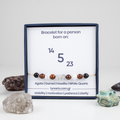 For fives (5, 14, 23): Agate, Garnet, Howlite, White Quartz bracelet on a cord