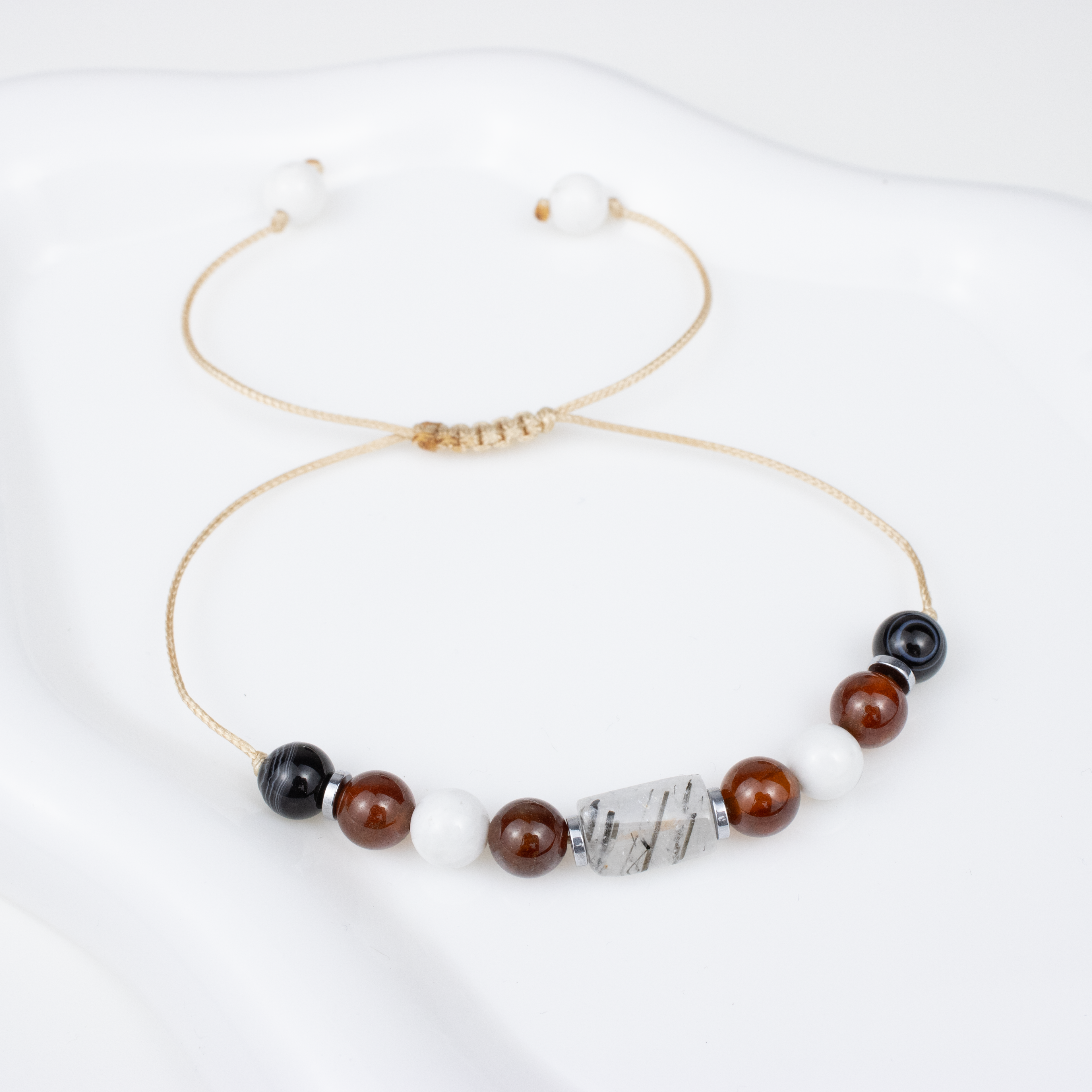For fives (5, 14, 23): Agate, Garnet, Howlite, White Quartz bracelet on a cord