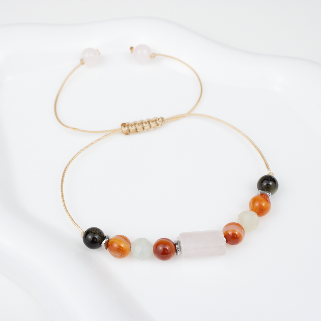 For sixes (6, 15, 24): Obsidian, Carnelian, Morganite, Rose Quartz bracelet on a cord