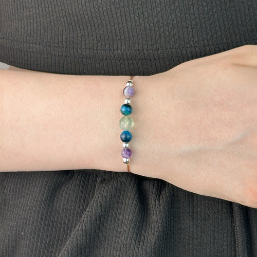 Bracelet made of Amethyst, Tiger’s Eye, and Fluorite stones