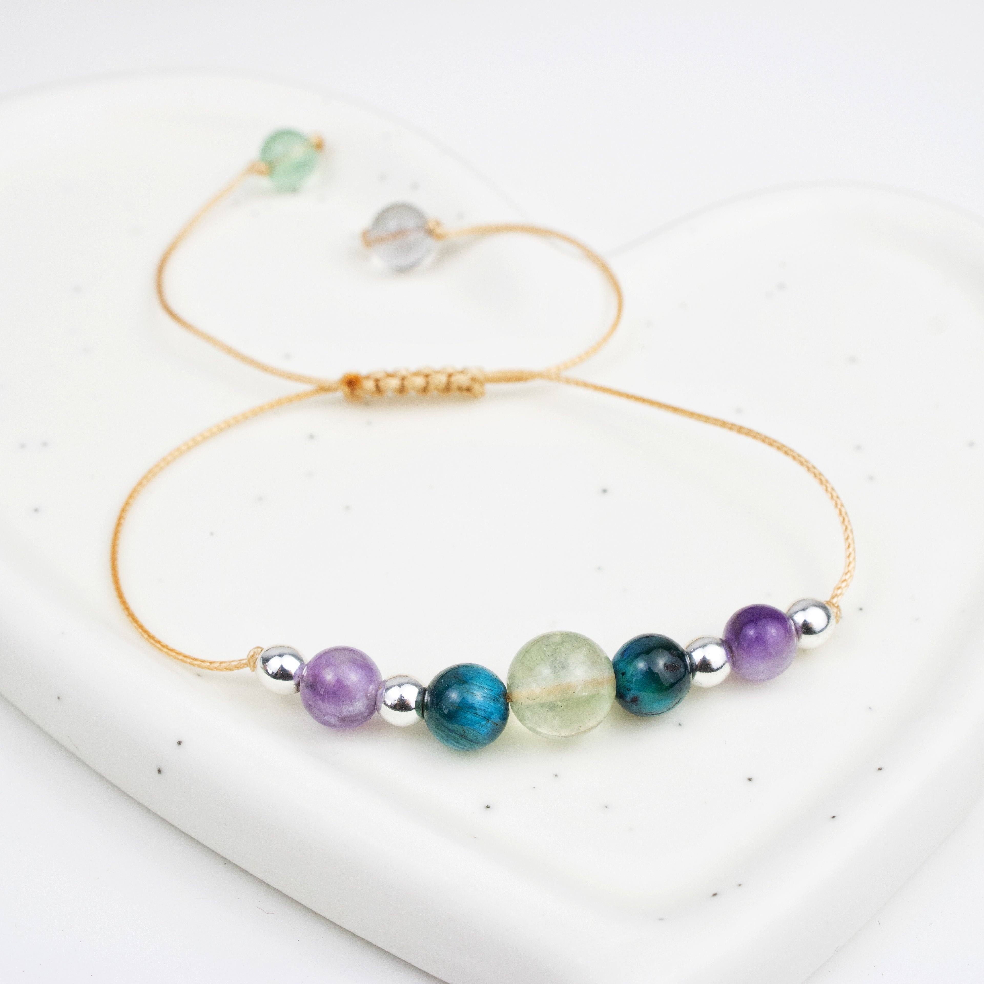 Bracelet made of Amethyst, Tiger’s Eye, and Fluorite stones