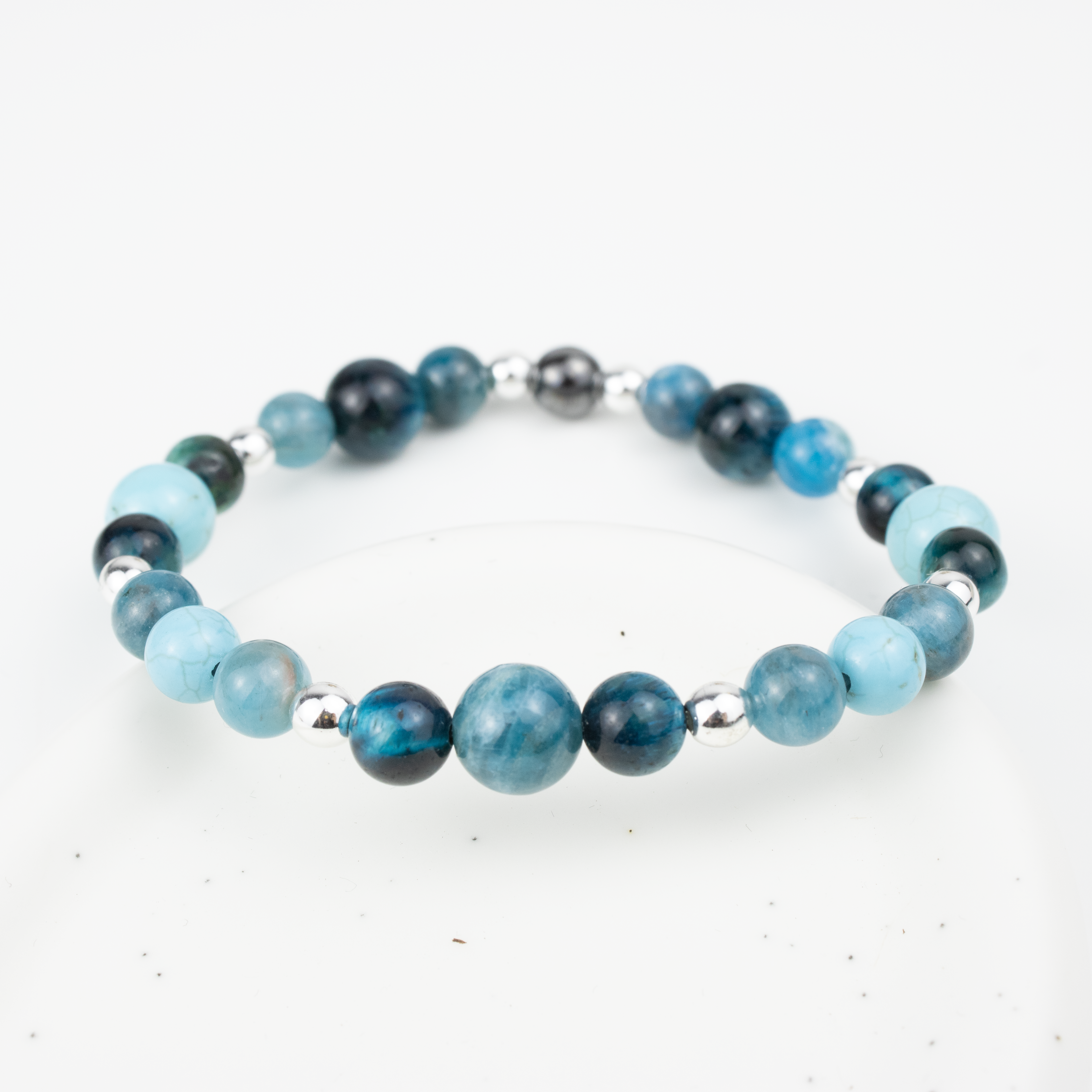 Bracelet made of natural Apatite, Turquoise, and Tiger’s Eye stones on elastic thread