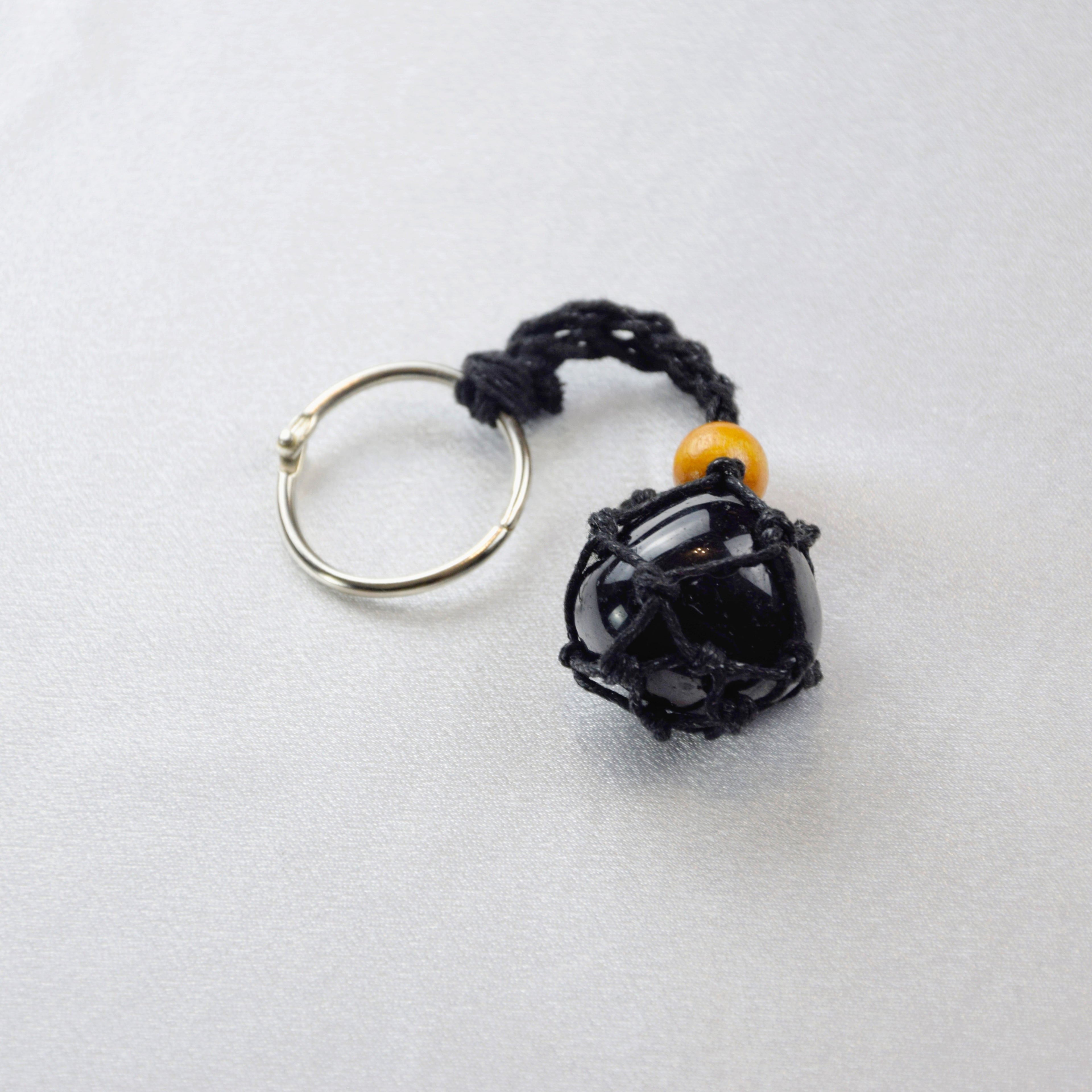 Keychain with a natural Tourmaline stone on a cord