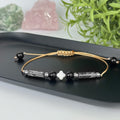 Bracelet made of Pearl, Grey Jasper, and Black Tourmaline stones for women