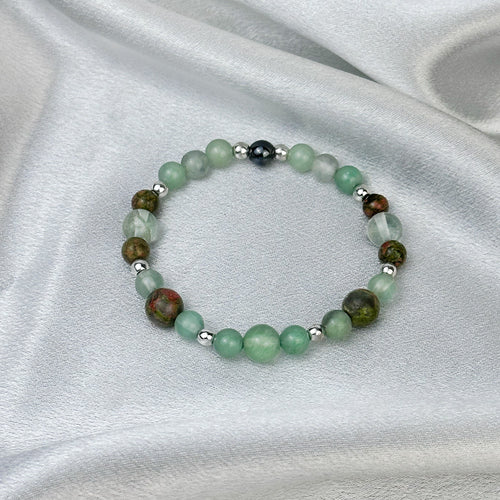 Bracelet made of natural Fluorite, Unakite, and Aventurine stones on elastic thread