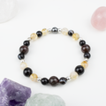 Bracelet made of natural Garnet, Agate, and Citrine stones on elastic thread