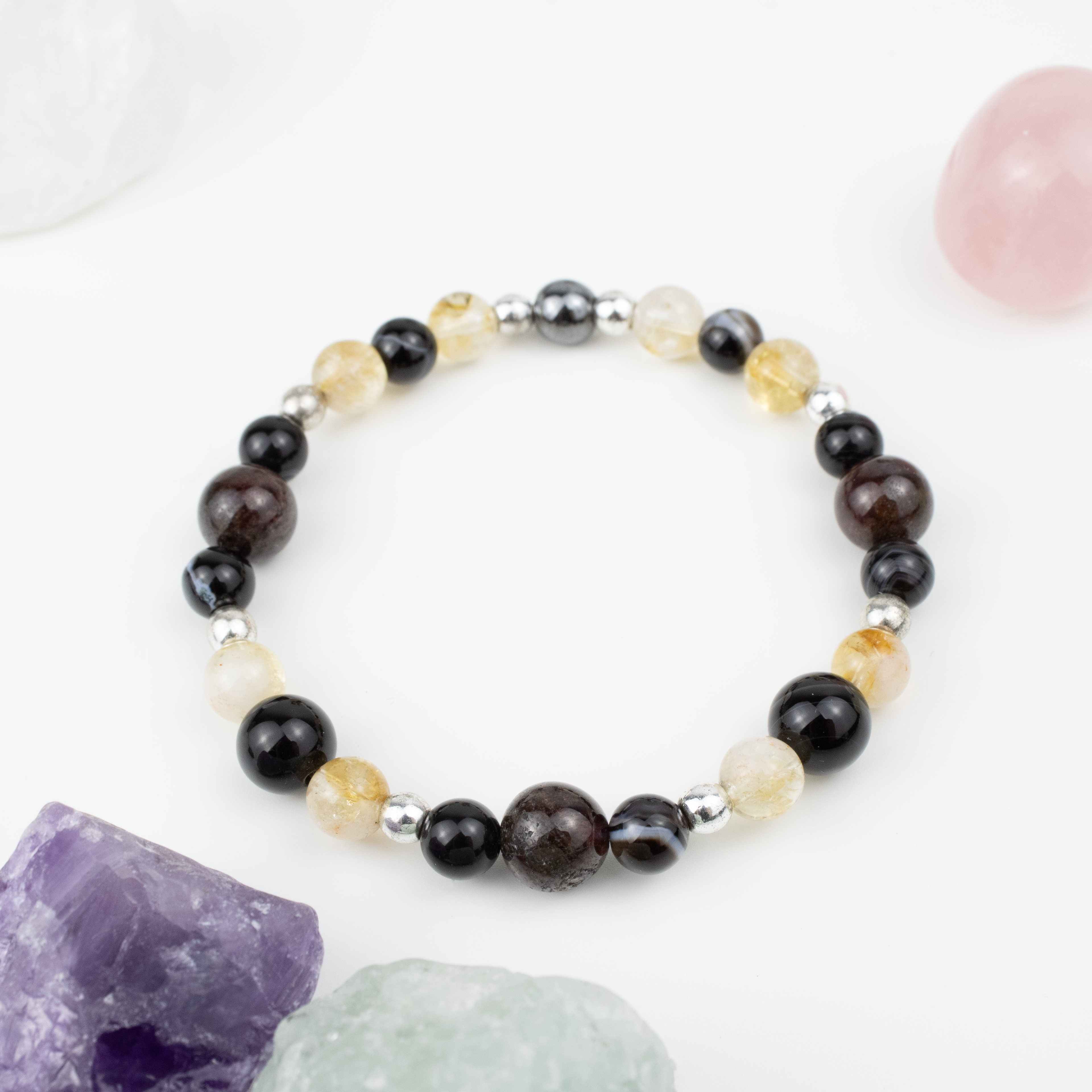 Bracelet made of natural Garnet, Agate, and Citrine stones on elastic thread