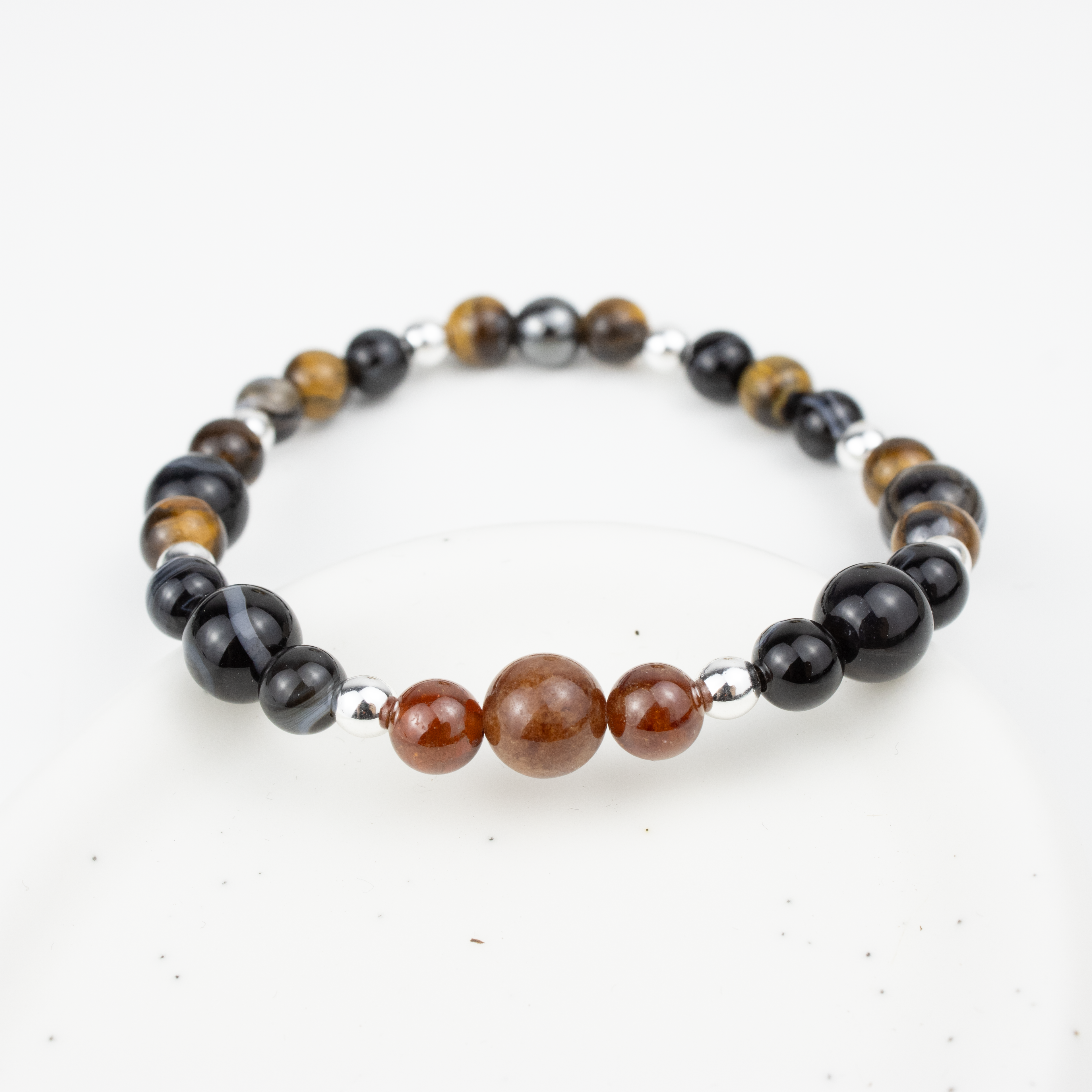Bracelet made of natural Garnet, Agate, and Tiger’s Eye stones on elastic thread