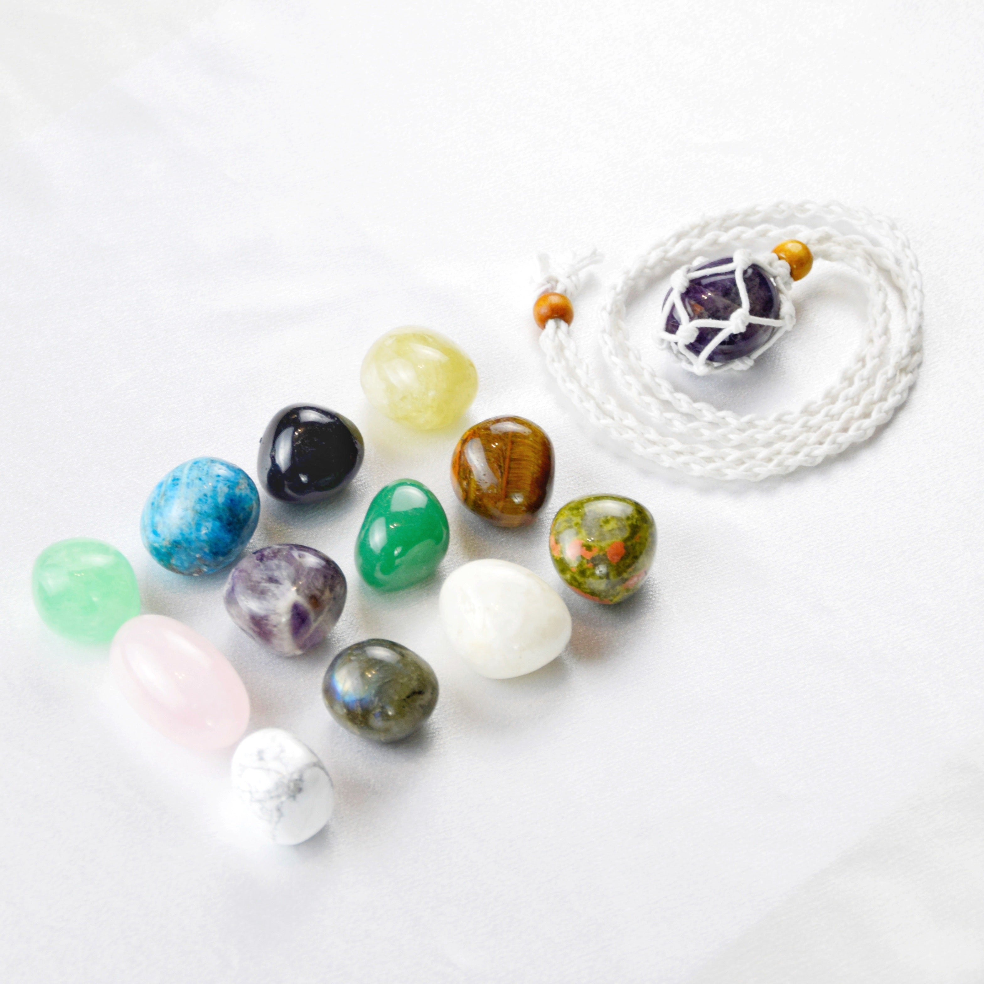 Natural Amethyst stone on an adjustable white cord