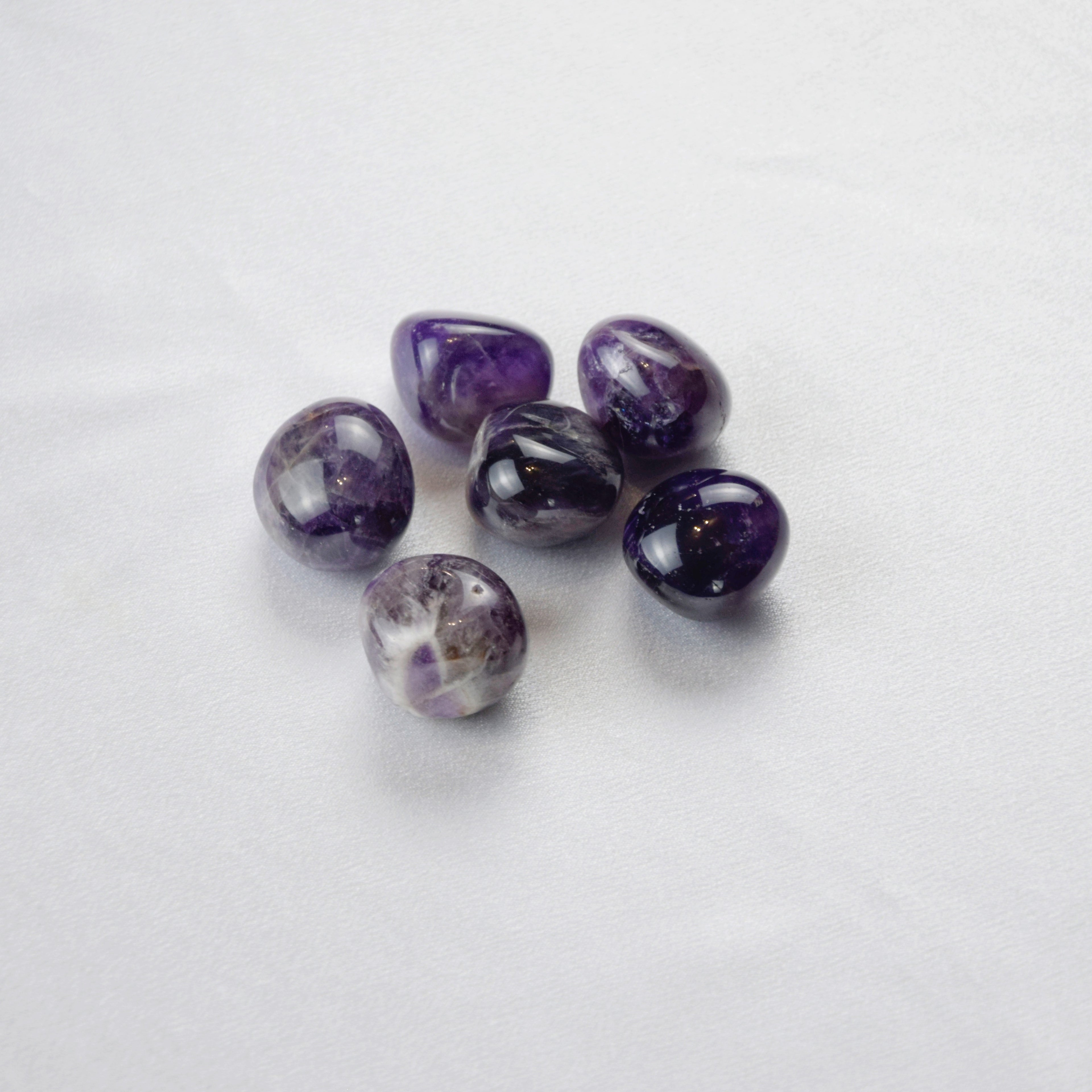 Natural Amethyst stone on an adjustable white cord
