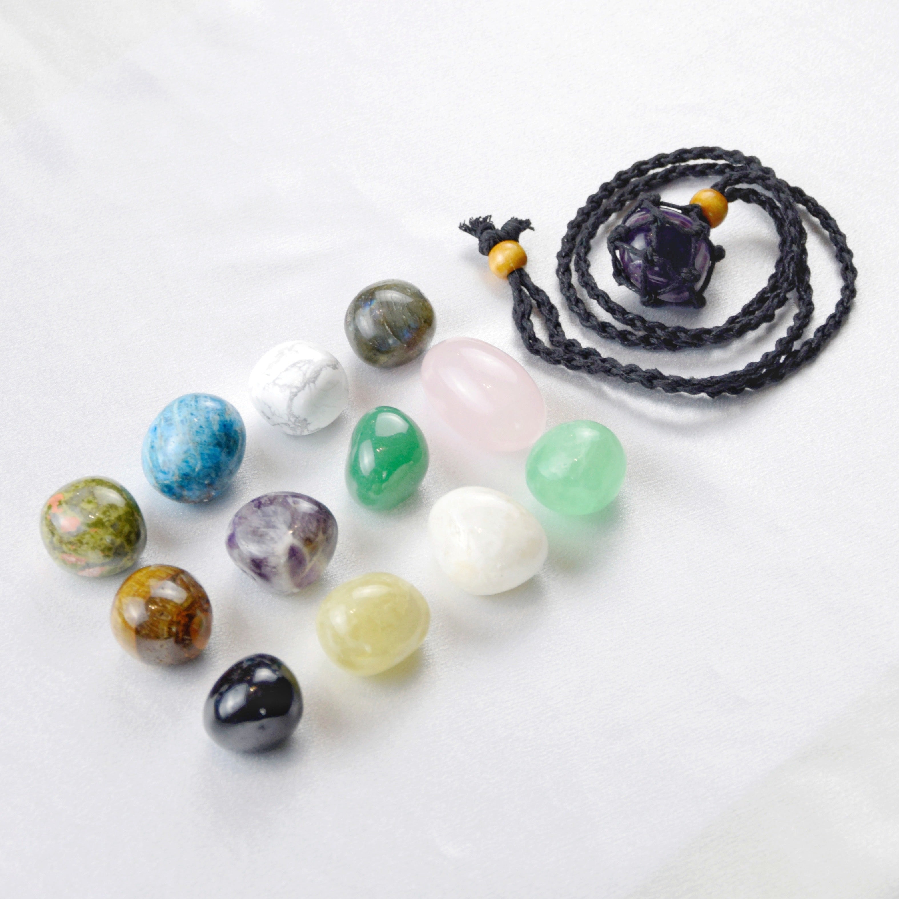 Natural Amethyst stone on an adjustable black cord