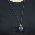 Natural Amethyst stone on an adjustable black cord