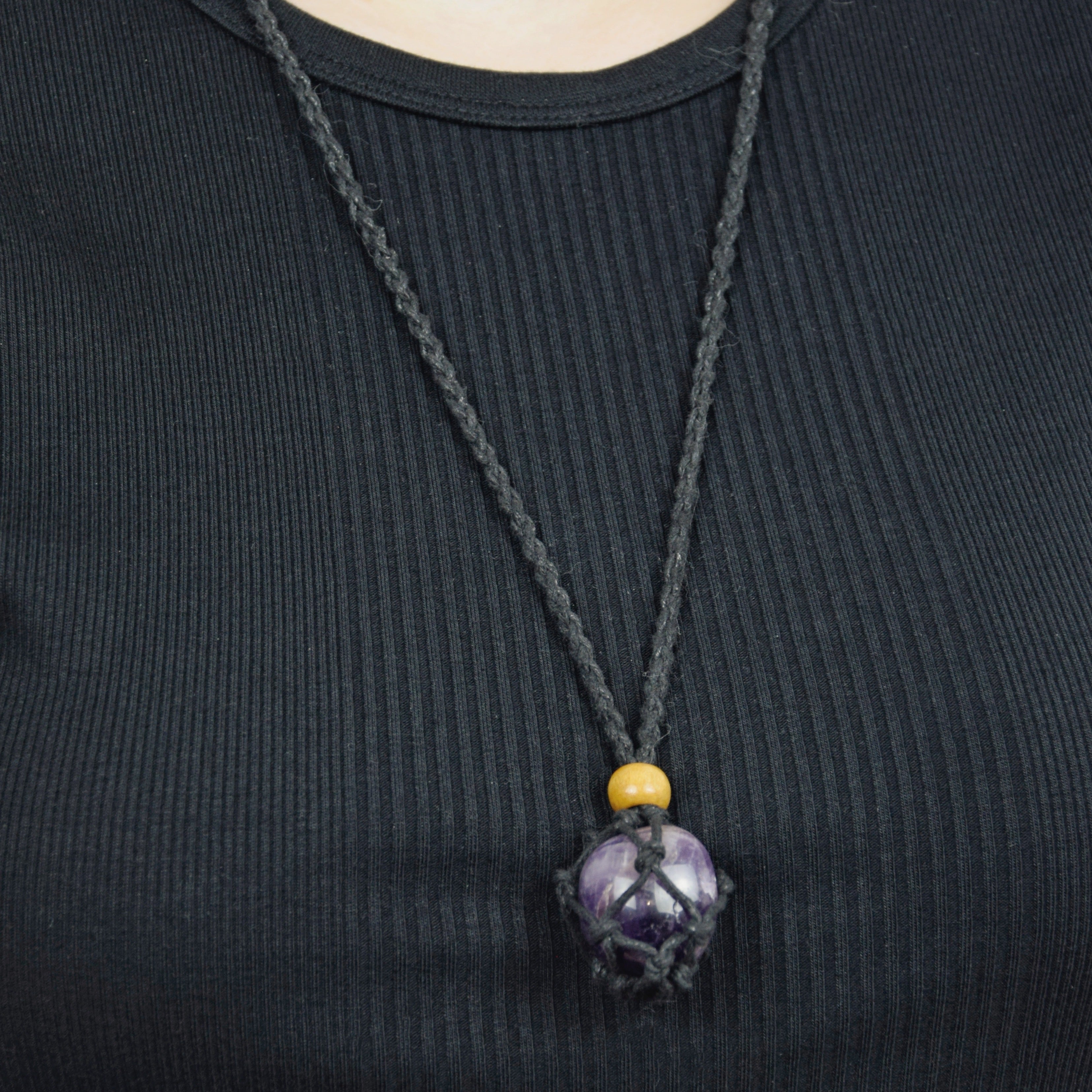 Natural Amethyst stone on an adjustable black cord