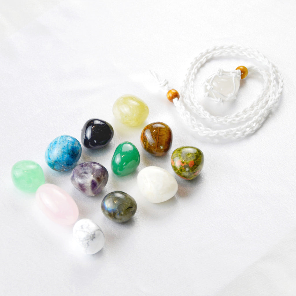 Natural Clear Quartz stone on an adjustable white cord