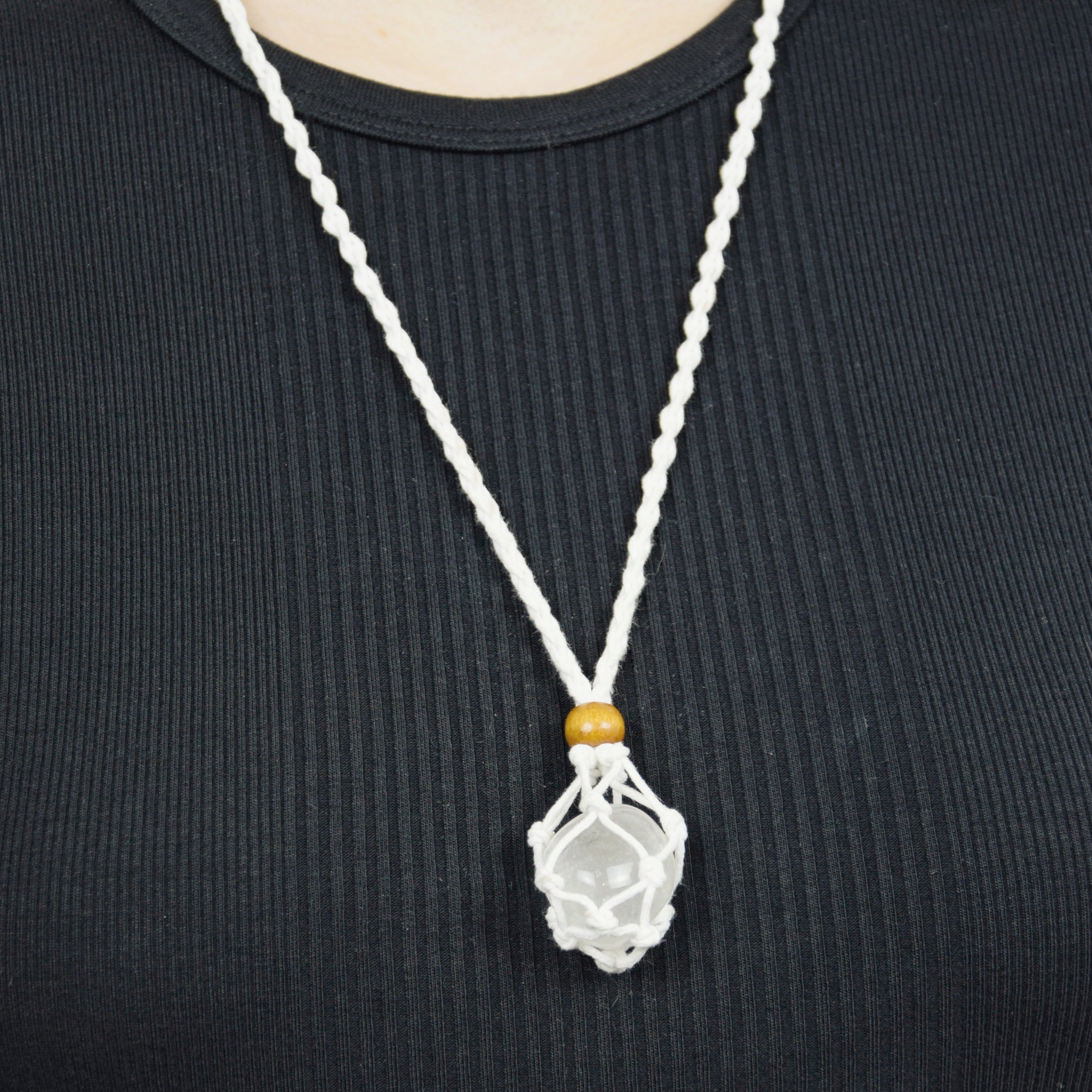 Natural Clear Quartz stone on an adjustable white cord