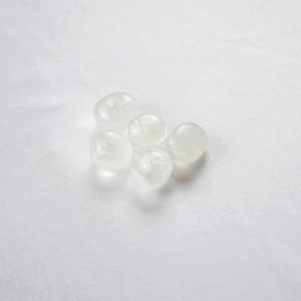 Natural Clear Quartz stone on an adjustable white cord