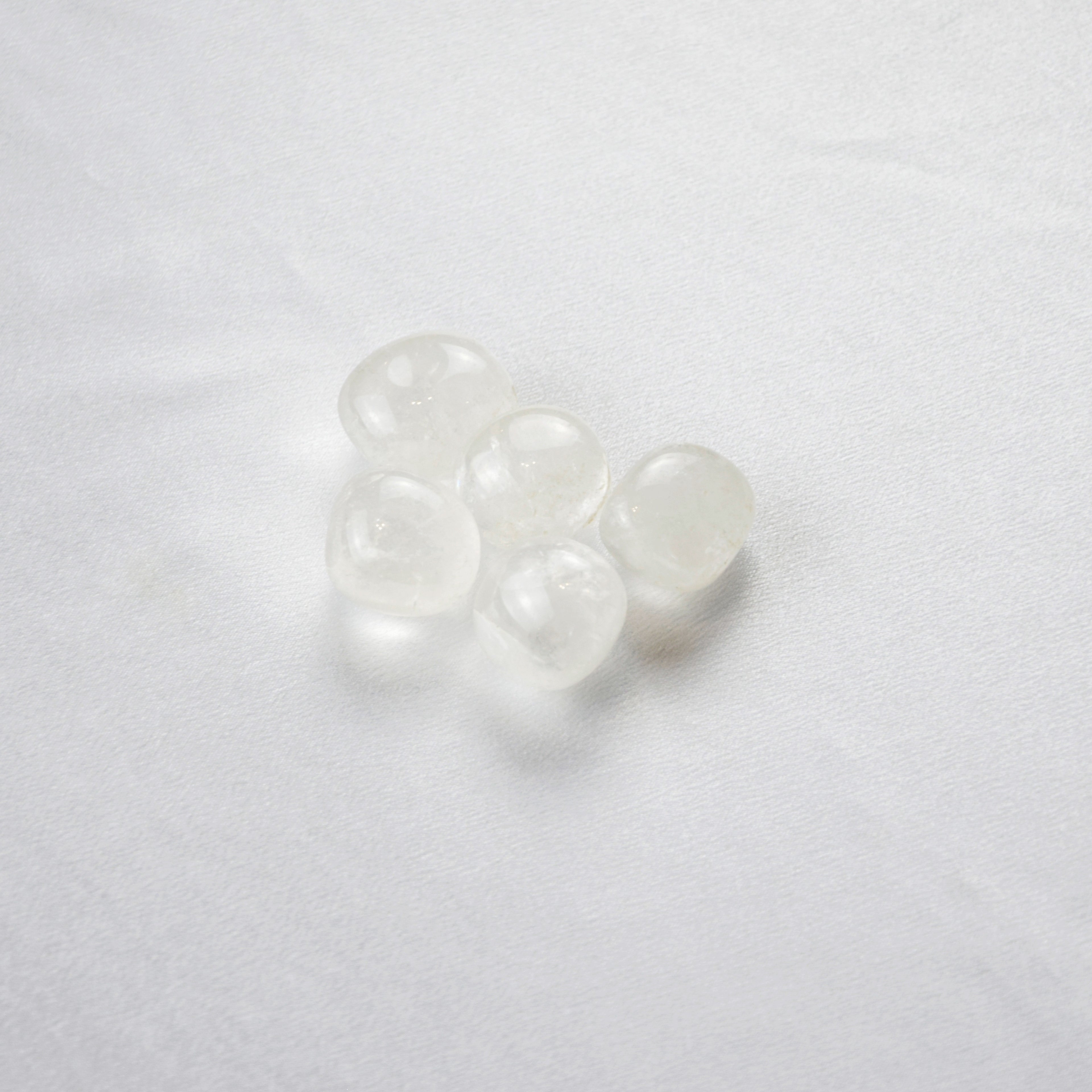 Natural Clear Quartz stone on an adjustable white cord