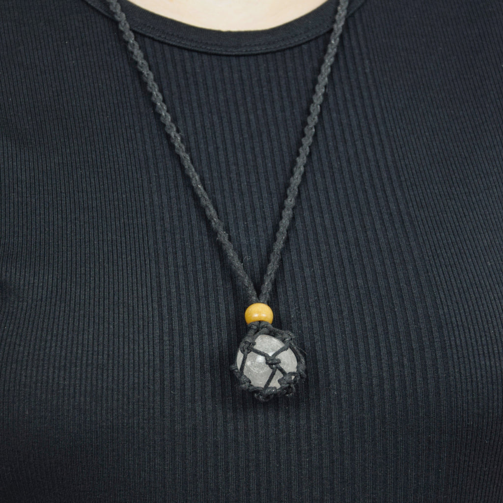 Natural Clear Quartz stone on an adjustable black cord