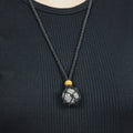 Natural Clear Quartz stone on an adjustable black cord