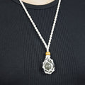 Natural Labradorite stone on an adjustable white cord