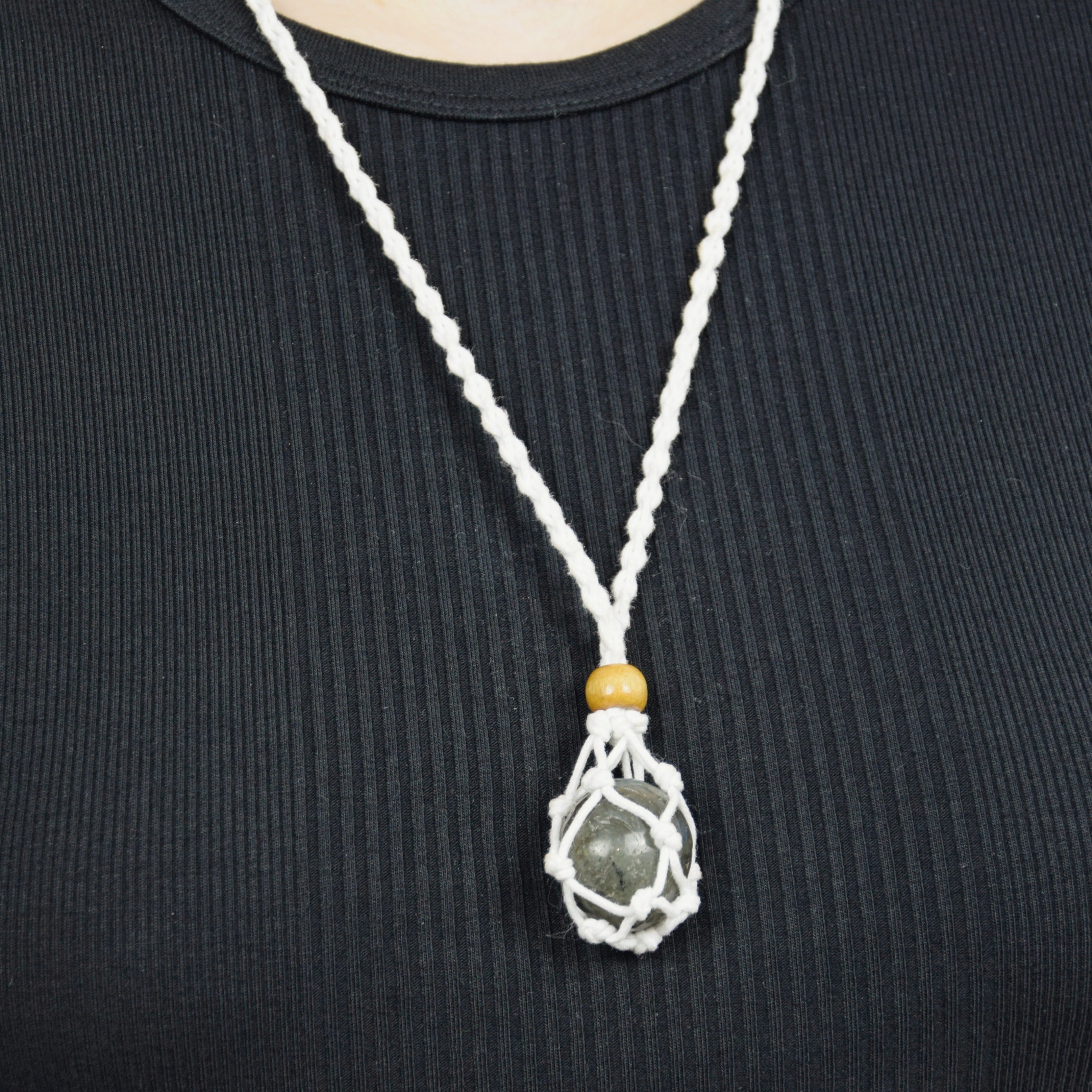 Natural Labradorite stone on an adjustable white cord