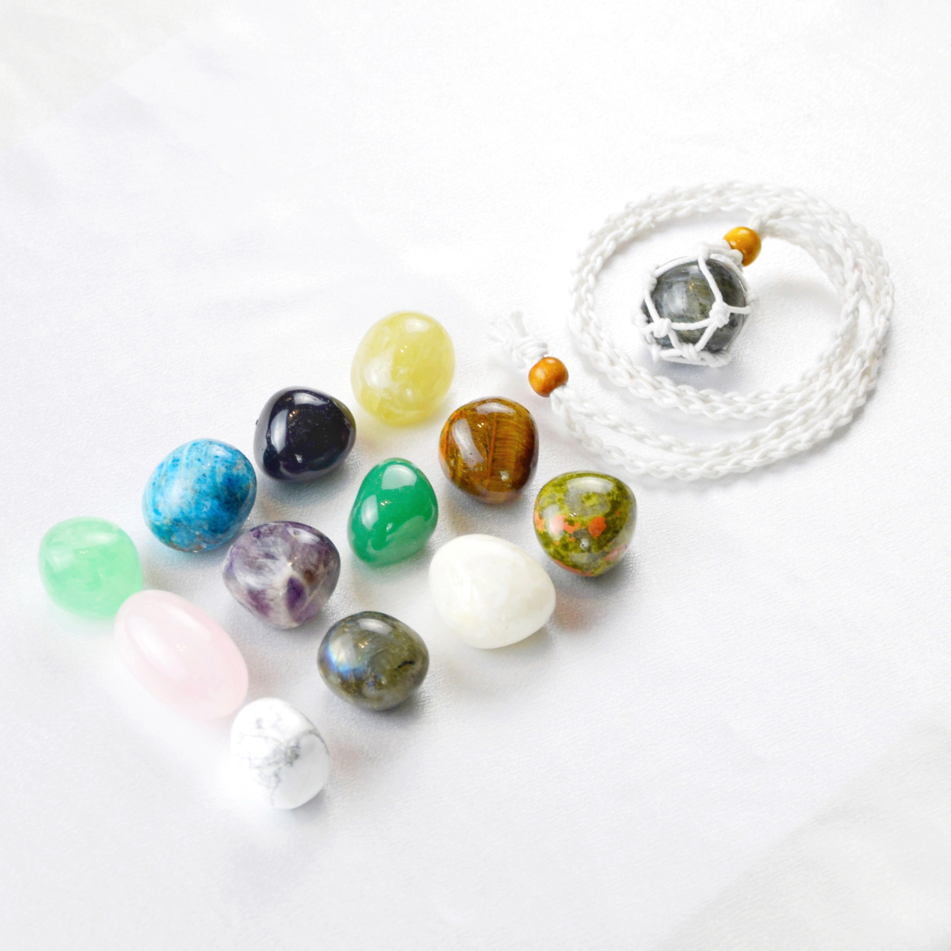 Natural Labradorite stone on an adjustable white cord