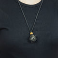 Natural Labradorite stone on an adjustable black cord