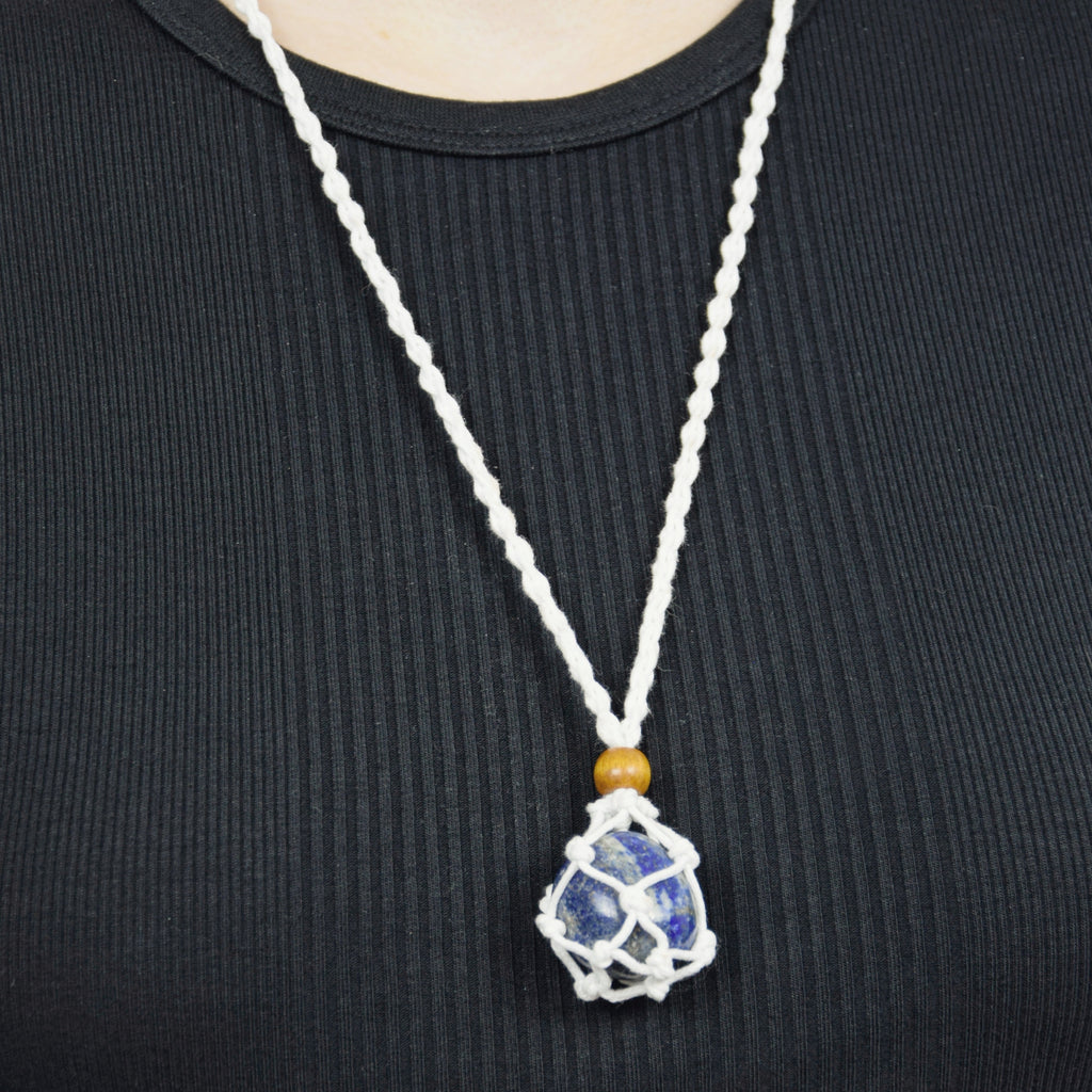 Natural Lapis Lazuli stone on an adjustable white cord