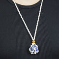 Natural Lapis Lazuli stone on an adjustable white cord