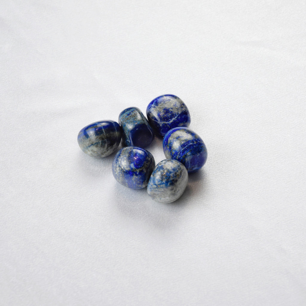Natural Lapis Lazuli stone on an adjustable white cord
