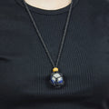 Natural Lapis Lazuli stone on an adjustable black cord