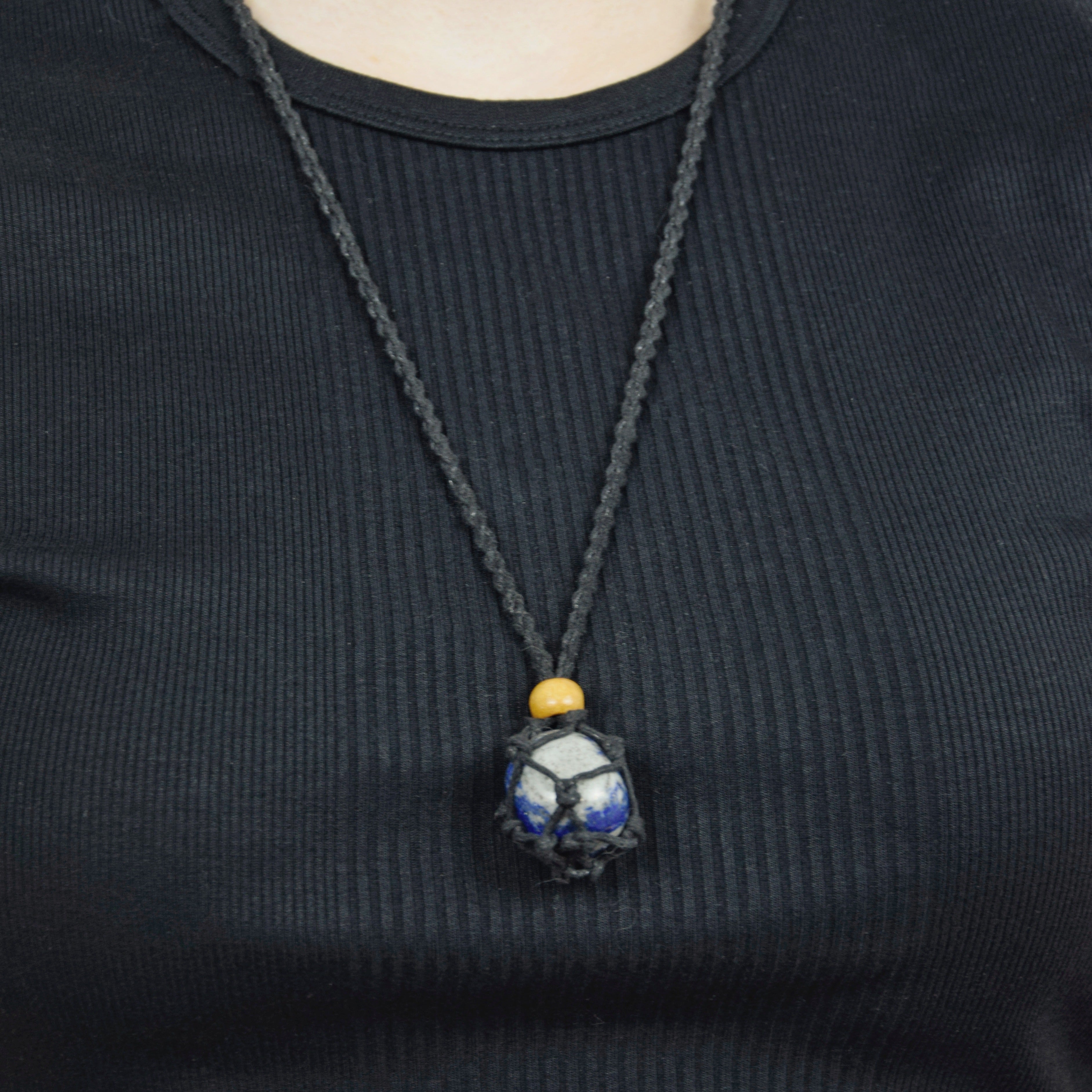 Natural Lapis Lazuli stone on an adjustable black cord