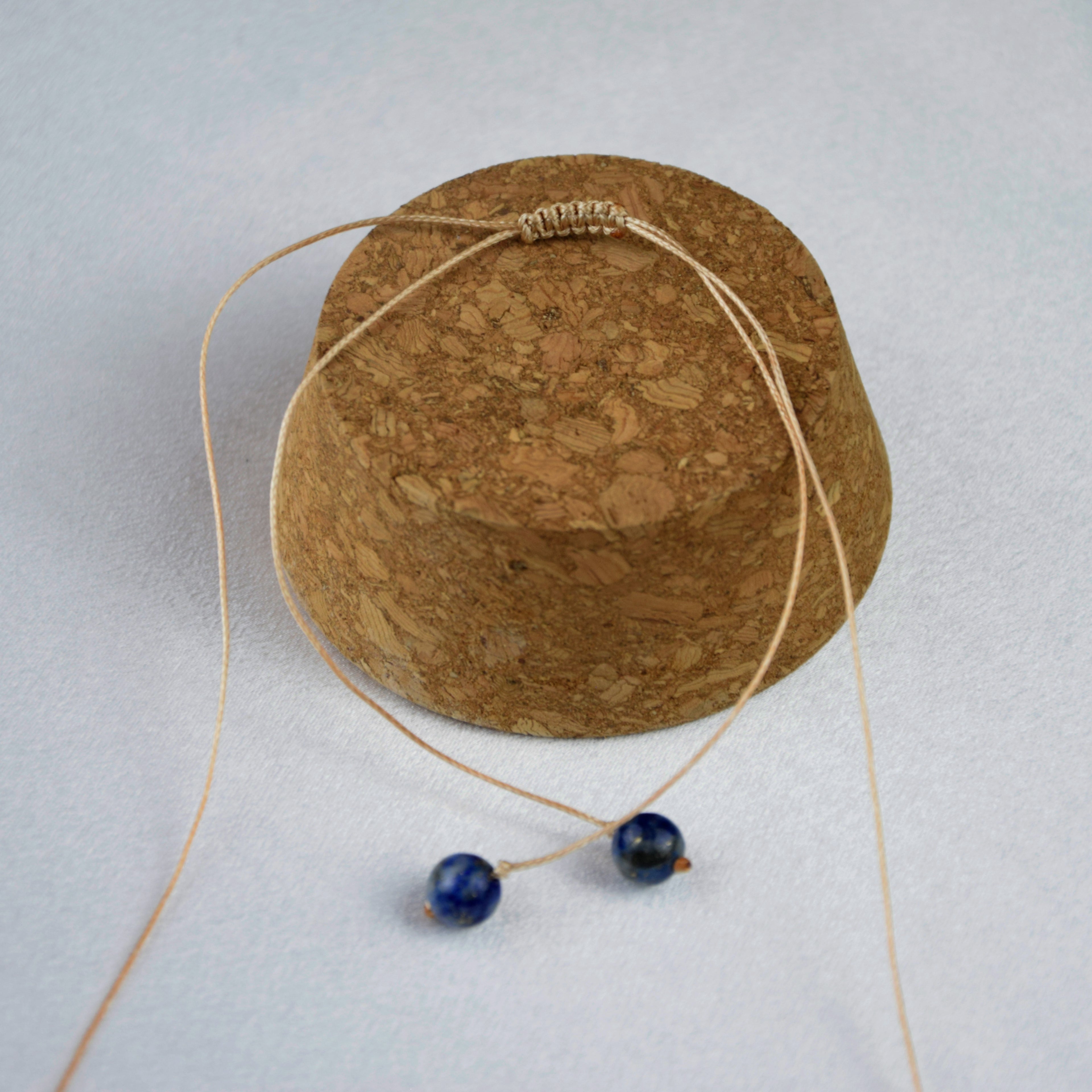 Natural Lapis Lazuli stone on an adjustable cord