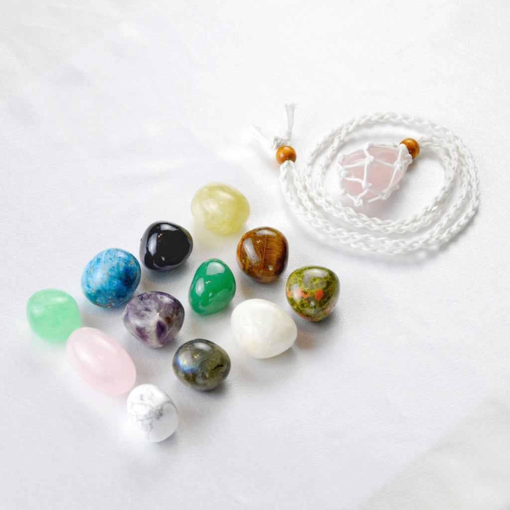 Natural Rose Quartz stone on an adjustable white cord