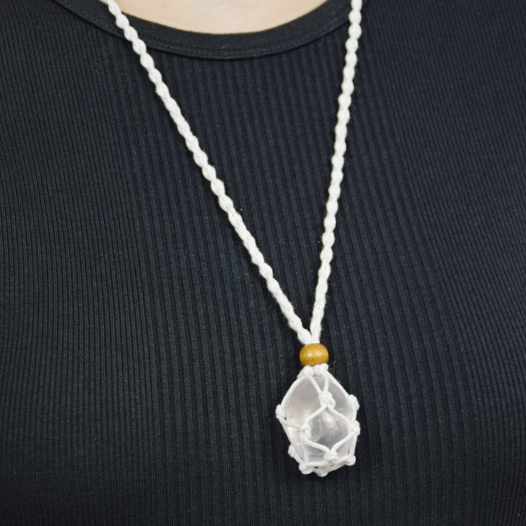 Natural Rose Quartz stone on an adjustable white cord