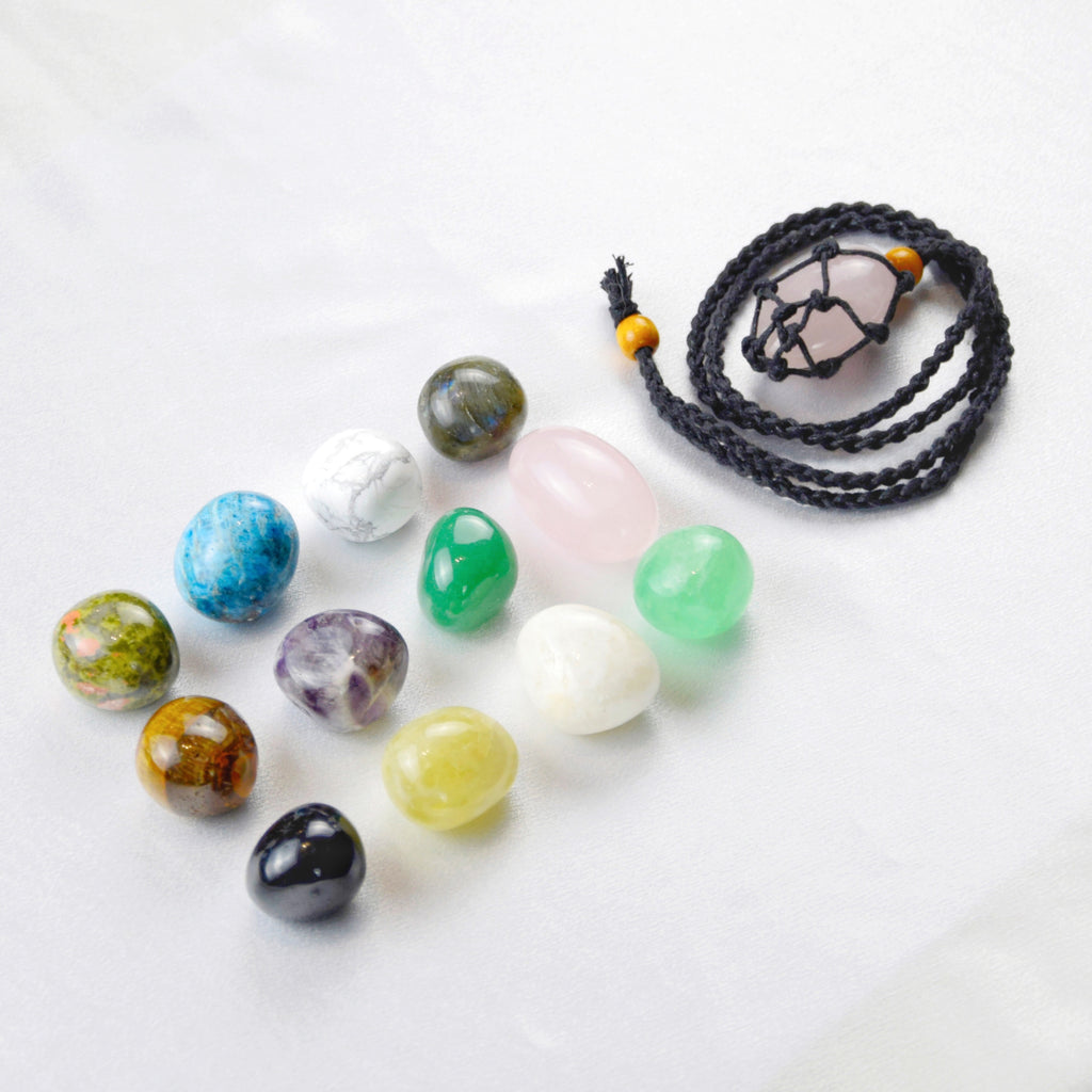 Natural Rose Quartz stone on an adjustable black cord