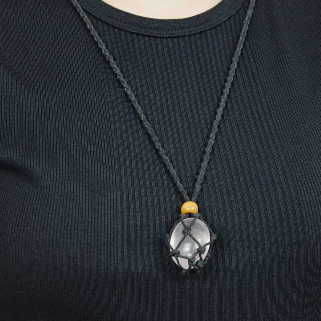 Natural Rose Quartz stone on an adjustable black cord