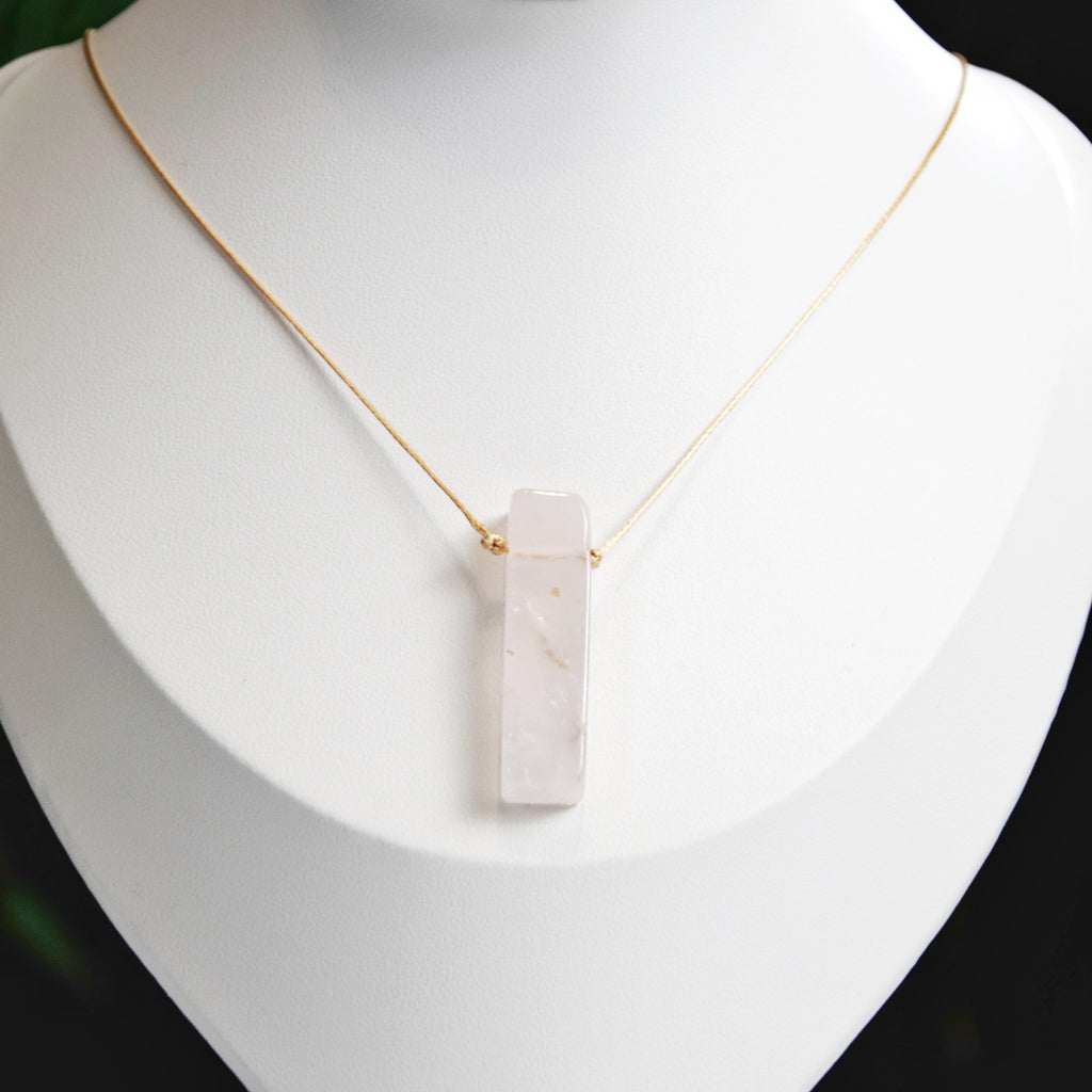 Natural Rose Quartz stone on an adjustable cord