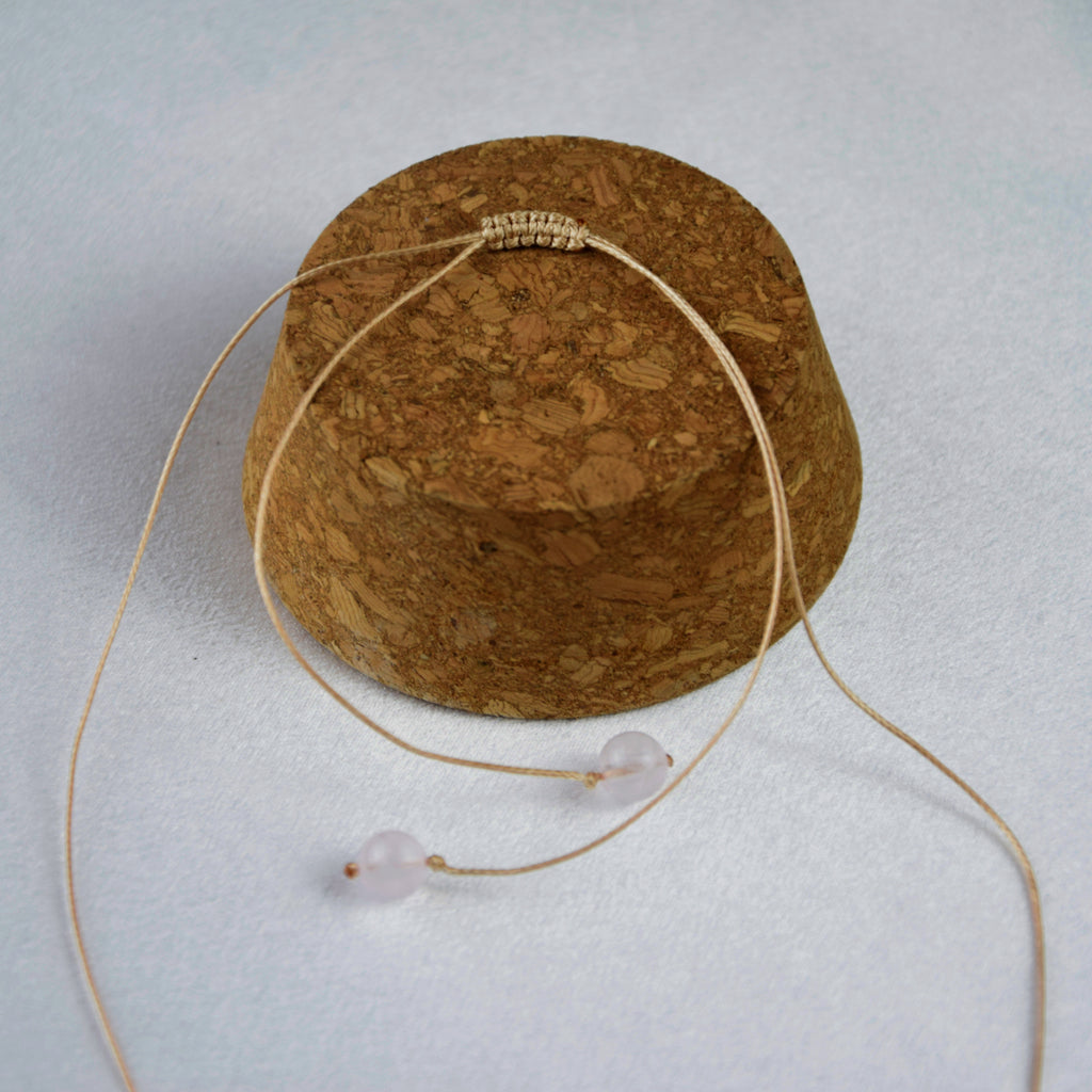 Natural Rose Quartz stone on an adjustable cord
