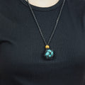 Natural Turquoise stone on an adjustable black cord