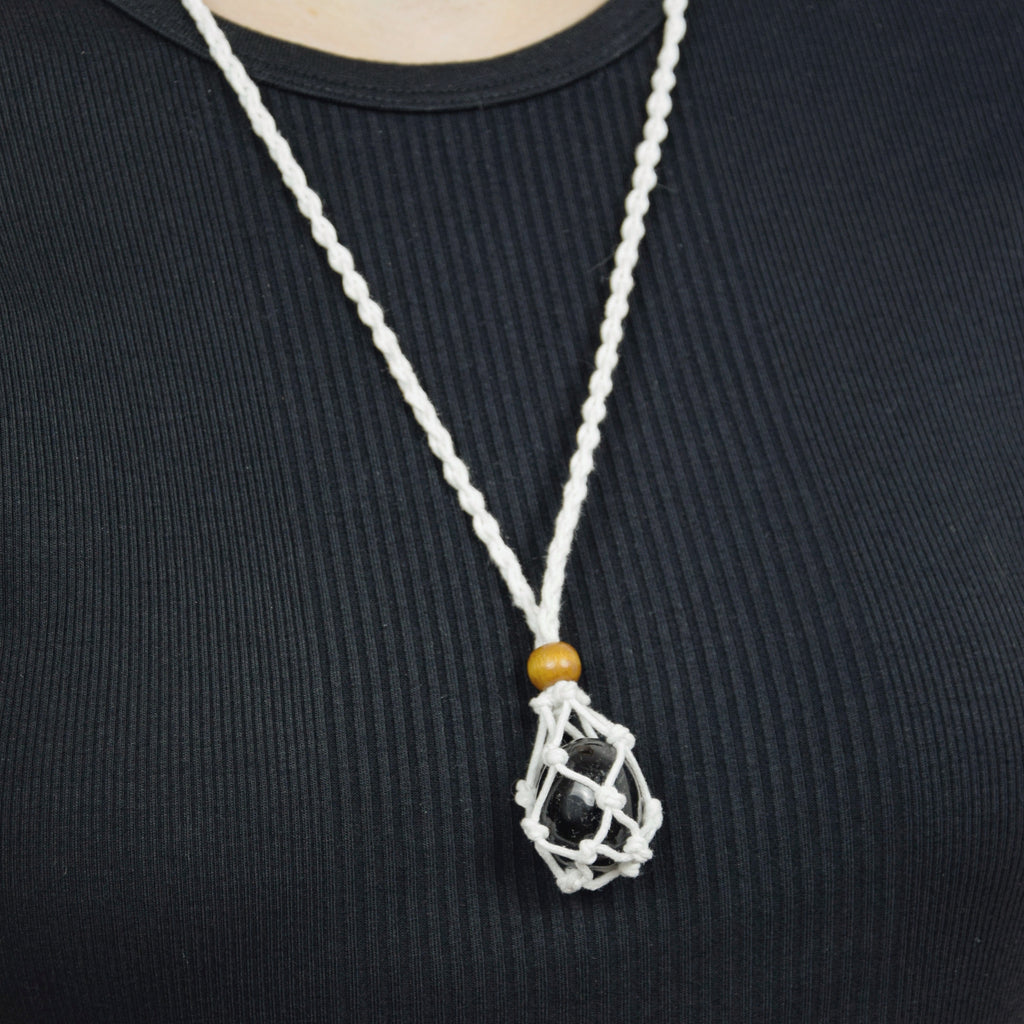 Natural Black Tourmaline stone on an adjustable white cord