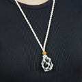 Natural Black Tourmaline stone on an adjustable white cord