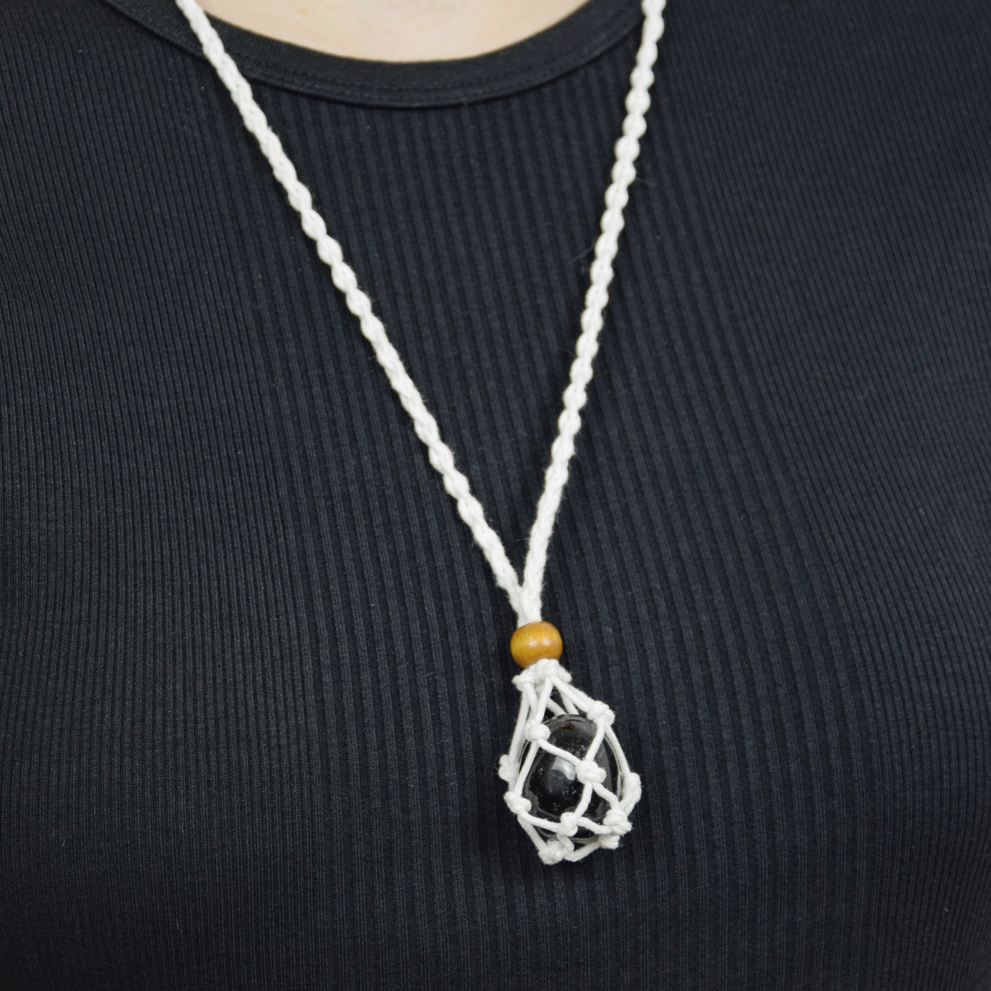 Natural Black Tourmaline stone on an adjustable white cord