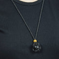 Natural Black Tourmaline stone on an adjustable black cord