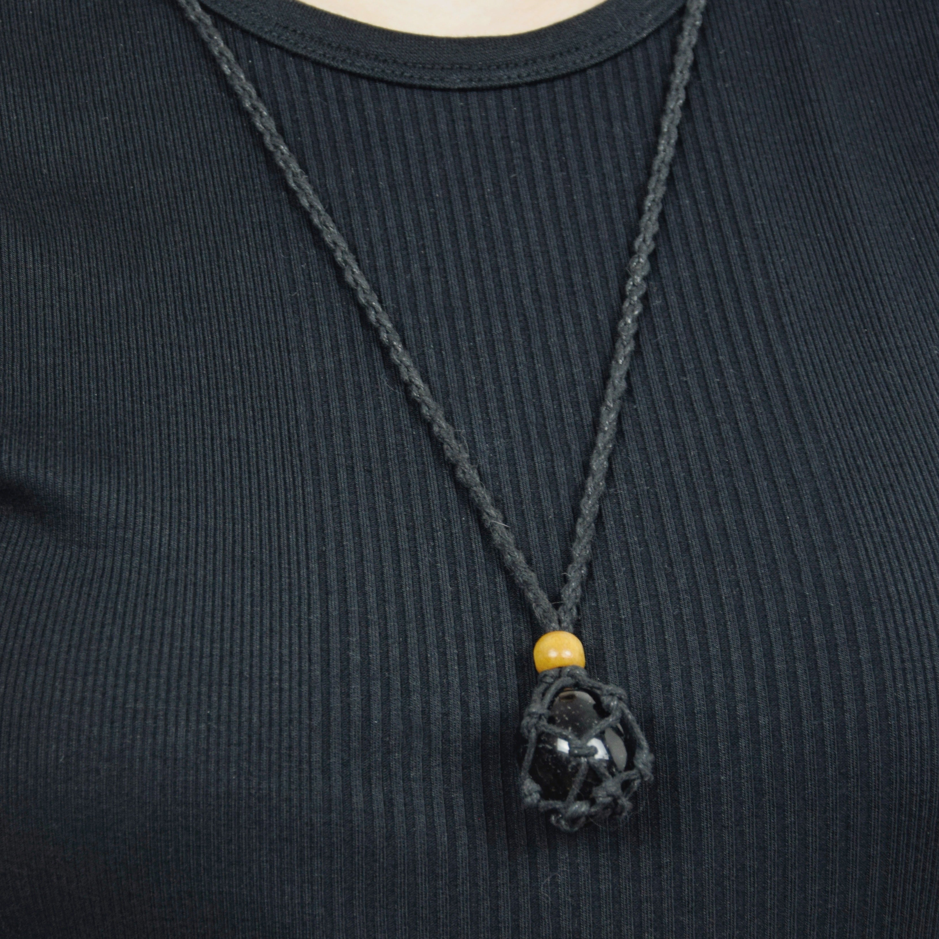 Natural Black Tourmaline stone on an adjustable black cord