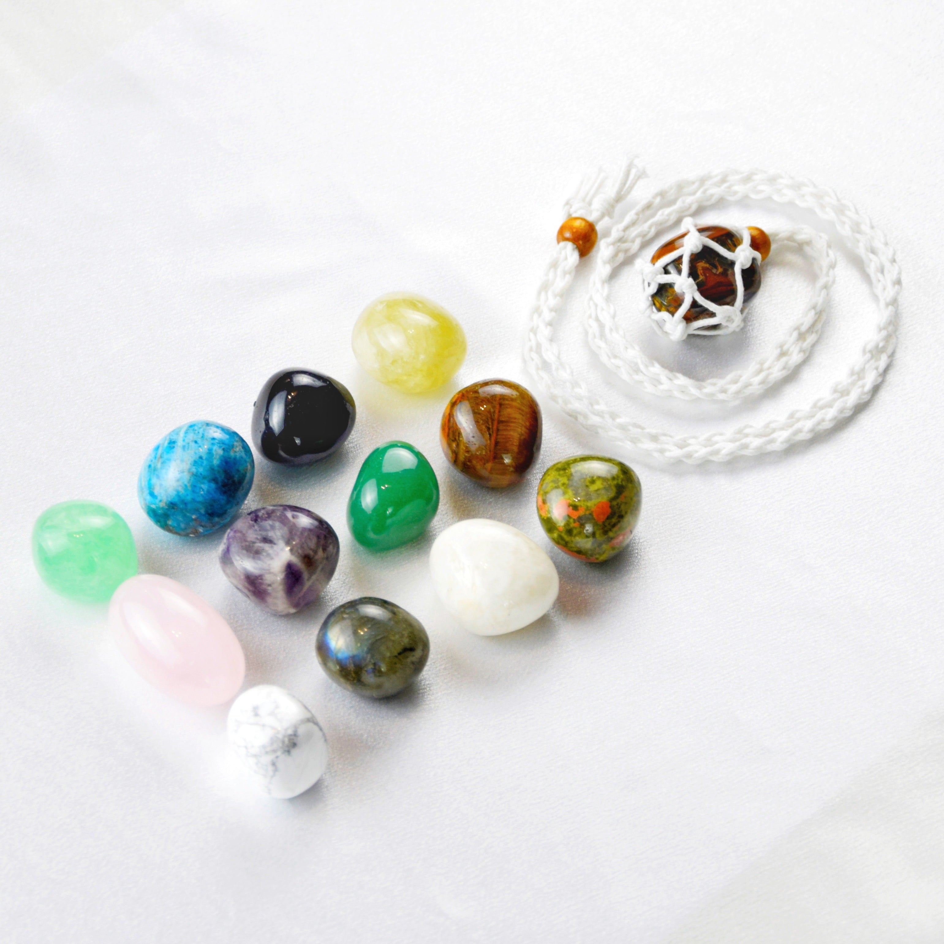 Natural Tiger’s Eye stone on an adjustable white cord