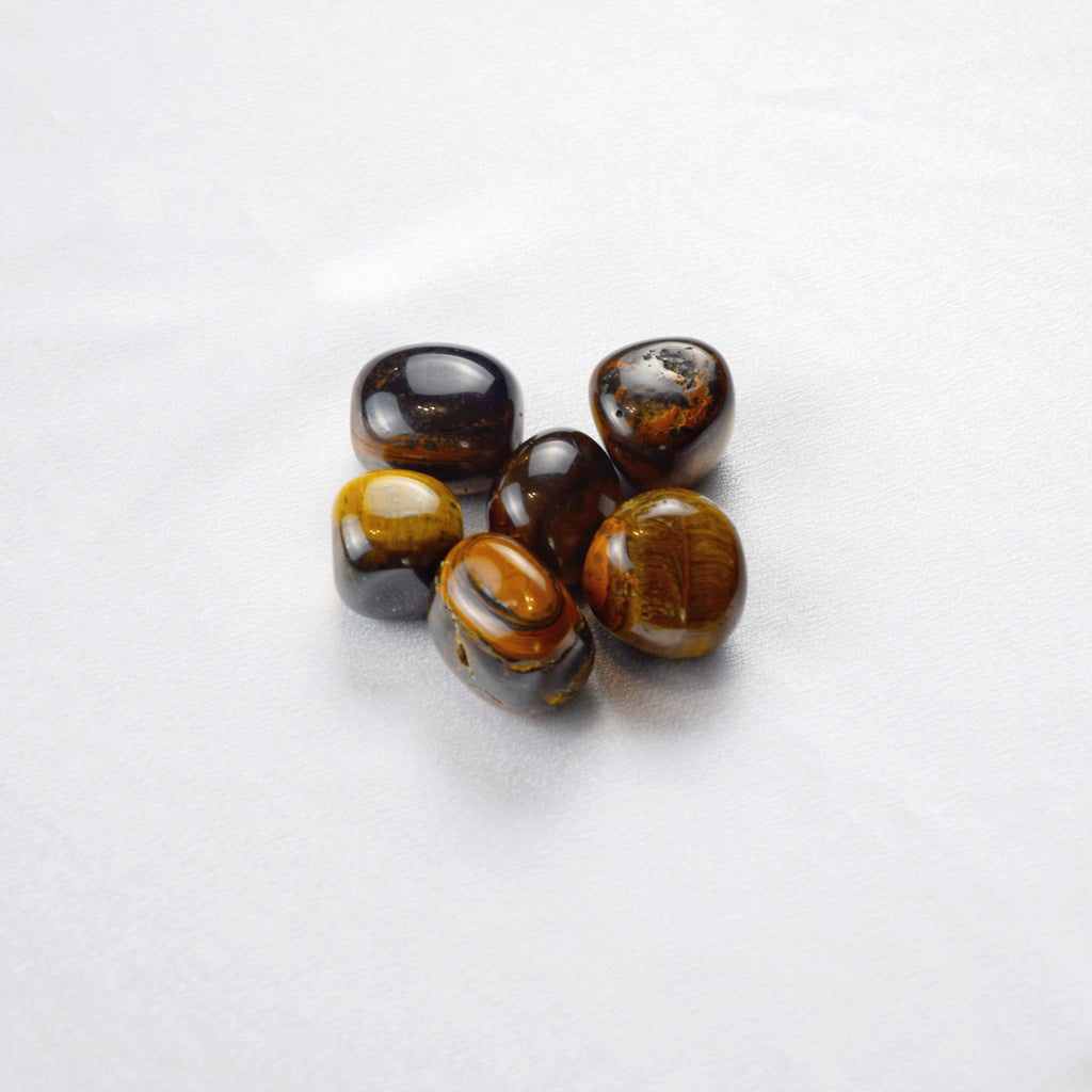 Natural Tiger’s Eye stone on an adjustable white cord