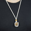 Natural Tiger’s Eye stone on an adjustable white cord