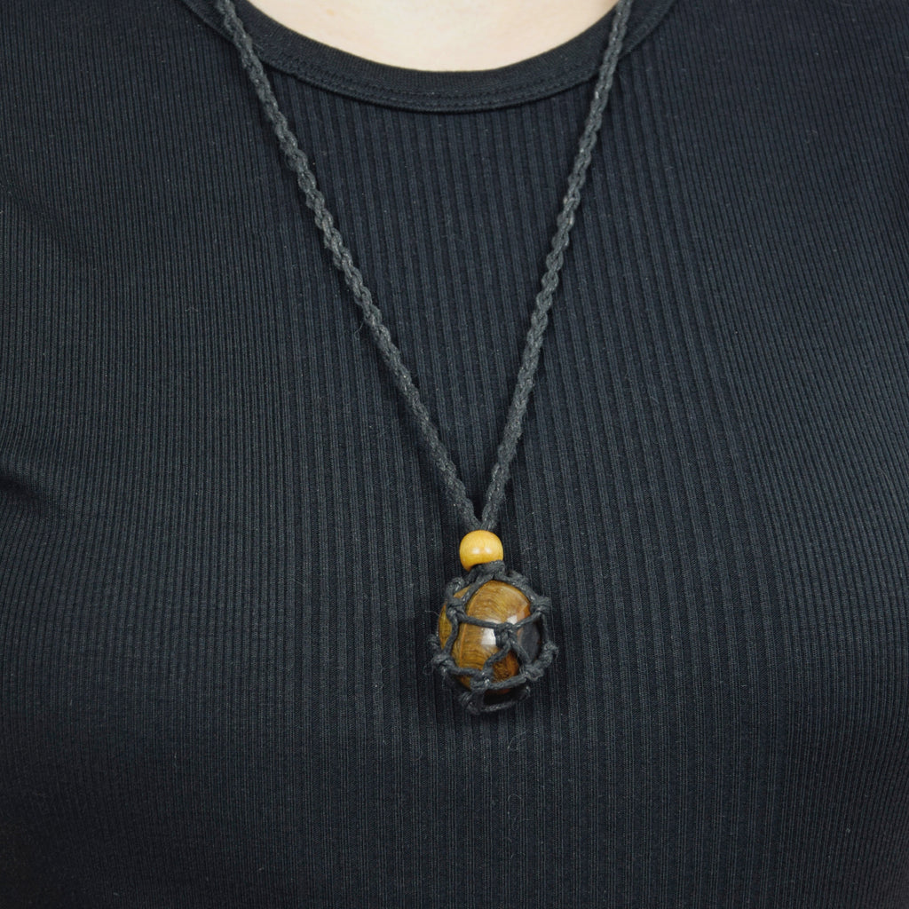 Natural Tiger’s Eye stone on an adjustable black cord